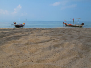 Obraz premium fishing motor boats moored on the sea coast