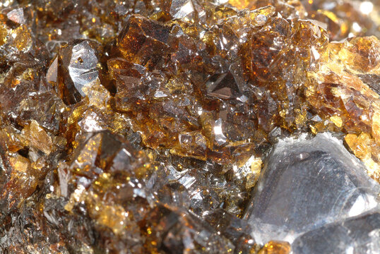 Mineral Sphalerite, Ruby sphalerite translucent honey coloured crystals with single galena crystal, Mogul Silver mines, Tipperary, Ireland