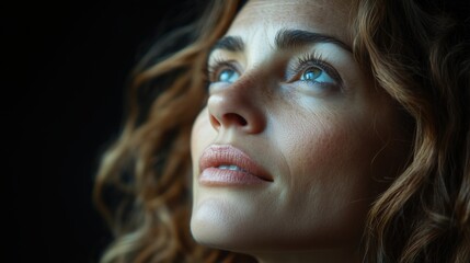 Close-up of a woman's face looking up, conveying hope, faith, confidence, and spirituality. Ai generated