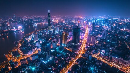 Fototapeta premium Nighttime cityscape aerial view ho chi minh city urban photography vibrant lights high angle modern metropolis