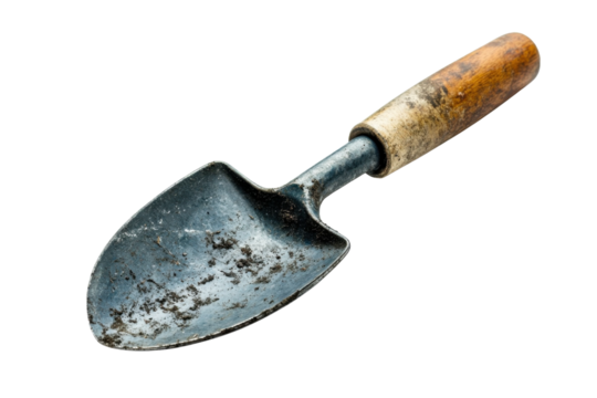 A weathered garden trowel resting on a white surface, ready for planting in the springtime garden isolated on transparent background