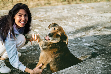 Happy Woman with her Adopted Stray Dog 