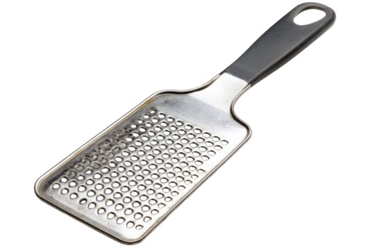 A sleek kitchen grater rests on a pristine countertop ready for culinary creativity at home isolated on transparent background
