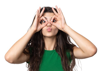 Smiling girl gesturing OK sign with her hand
