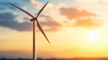 Wind turbine against vibrant sunset sky