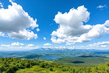 Fototapeta premium Serene Mountain Lake Landscape Under a Bright Blue Sky