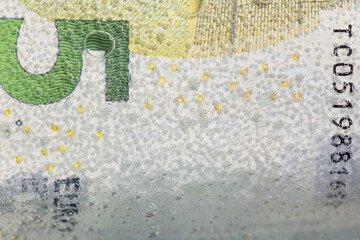 Currency Note Under Water Droplets with Artistic Abstract Background