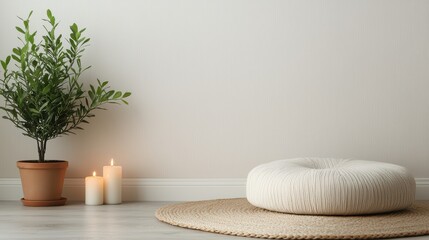 Healthy lifestyle choices for better well-being concept. Cozy interior scene with a plant, candles and a round cushion on the floor.
