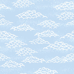 Seamless vector pattern with stylized white clouds on a soft blue textured background. Inspired by traditional Asian motifs, this elegant sky design is perfect for textiles, wallpapers, wrapping paper