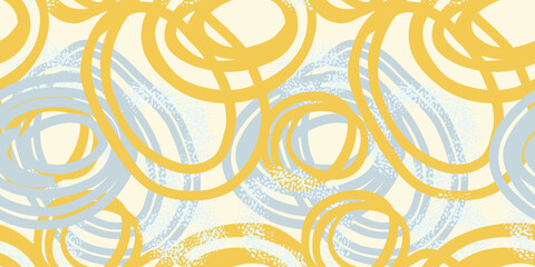 Seamless vector pattern with abstract hand drawn circles in yellow and blue tones. Dynamic, energetic brush strokes create a modern artistic design, perfect for textiles, packaging, wallpapers