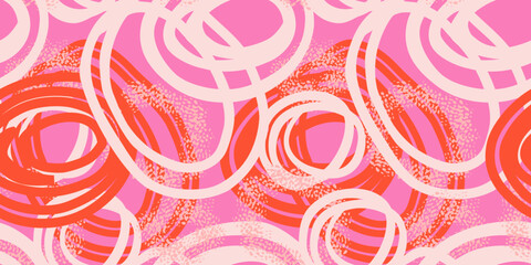 Seamless vector pattern with abstract hand drawn circles in pink and orange and coral tones. Dynamic, energetic brush strokes create a modern artistic design, perfect for textiles, packaging