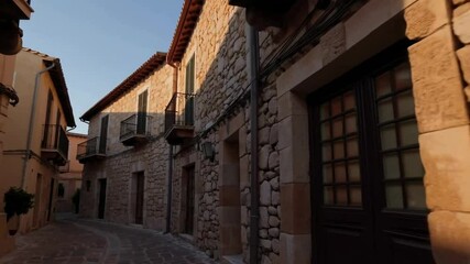 Serene mediterranean stone alleyway at sunset with rustic charm