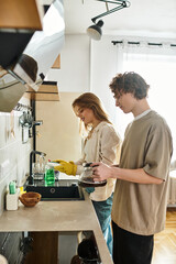 Loving couple sharing moments in their cozy kitchen while preparing tea together