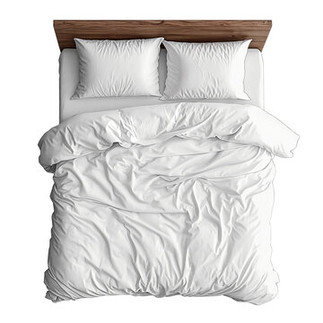 top view of bed with white linens on white background