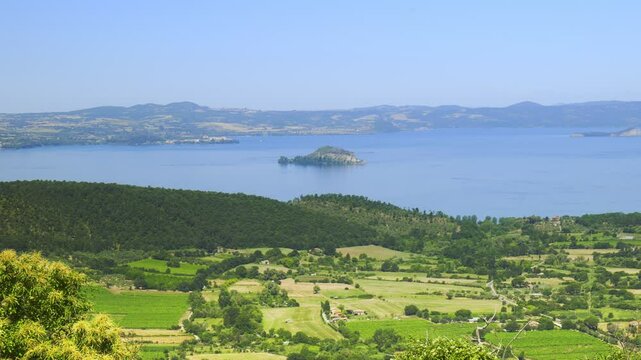 Montefiascone, Italy. View of Lake Bolsena from Montefiascone. Countryside areas near the lake and hills. Natural environment in the province of Viterbo.