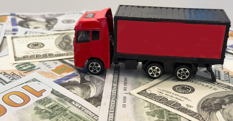 a toy truck is on the banknotes