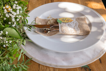cutlery on a white porcelain plate