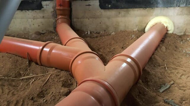 Sewer pipes laid in a country house. Construction.