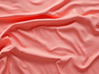 Textile creations soft coral fabric close-up studio setting textured imagery artistic view