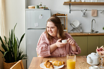 Confidence and joy shine in the cozy kitchen of a young woman enjoying her morning