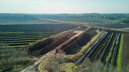 Lower Saxony, Germany - March 23, 2025: Drone footage of a peat mining area in Lower Saxony
