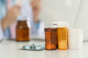 Medicines and Patient Care. Prescription bottles and medications organized for effective healthcare management.