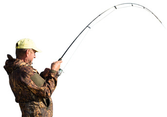 Fishing in the reeds for spinning on quiet water. A man in camouflage clothes in cool weather is...