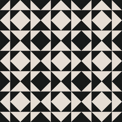 Seamless geometric half square triangle pattern in black and white. Graphical illustration for a unique wall decor, textiles and interior design.	
