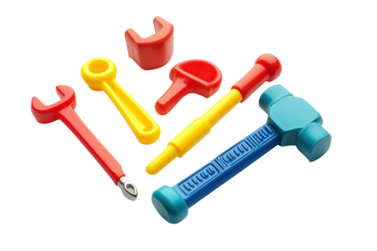 Bright toy tools arranged playfully on white for imaginative activities for kids isolated on transparent background