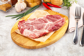 Raw pork neck steak for grill