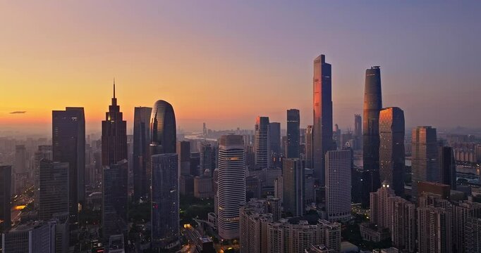 Aerial view of Guangzhou city skyline and modern buildings scenery at sunrise 