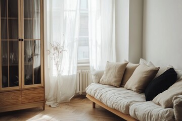 Fototapeta premium Cozy living room with natural light, wooden cabinet, and linen sofa