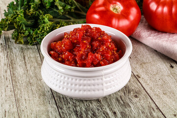 Diced ripe tomato with sauce