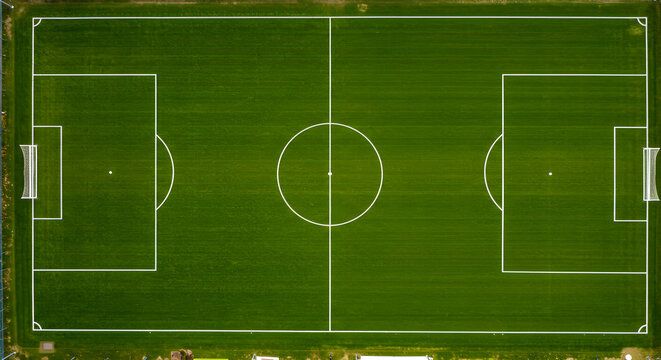 Aerial view of a meticulously marked soccer field ready for a thrilling match