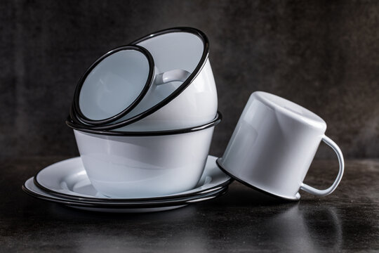 Vintage dishware on dark slate background