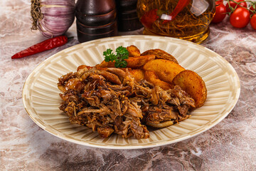 Baked shredded pork with potato