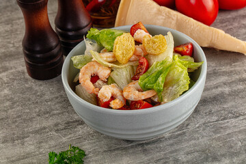 Tasty caesar salad with prawn