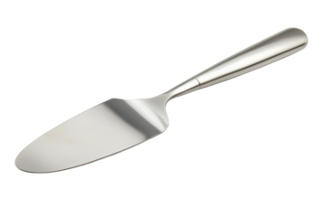 A sleek stainless steel cake server resting elegantly against a pure white background isolated on transparent background