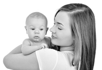 Mother and baby playing and smiling. Happy family.