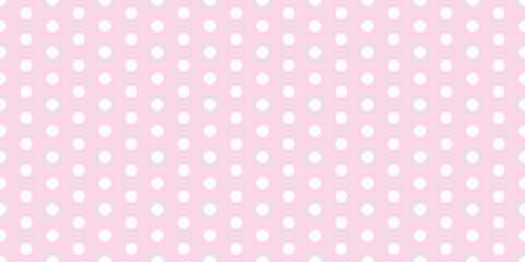 Soft pink polka dot seamless pattern on a light pastel background. Ideal for baby showers, nursery decor, gift wrap, scrapbooking, and feminine textile prints. Vector format for versatile use.