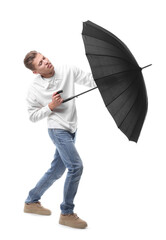 Man with black umbrella on white background