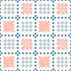 Patchwork seamless checkered pattern with flowers. Groovy retro background. Fabric textile print. Surface cover design.