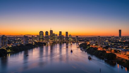 Fototapeta premium Striking cityscape of Brisbane, Australia at twilight, with a river & skyscrapers.