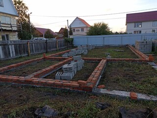 a plot of land on which construction of a foundation has begun