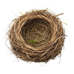 Obraz premium A circular bird's nest made of twigs and grass, featuring a small green leaf inside.