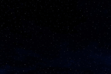 Starry night sky. Colourful galaxy space. Glowing stars in the night. New Year, Christmas and celebration background concept.