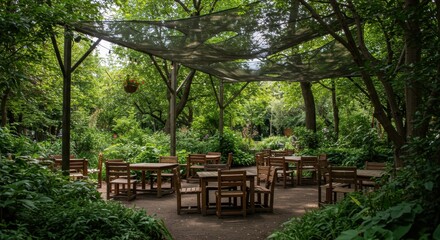 Obraz premium A serene outdoor cafe nestled in a lush urban park features shaded wooden seating surrounded by greenery, perfect for leisurely dining and relaxation