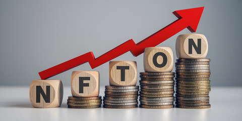 Wooden cubes spelling NFT on stacks of coins, topped by a red upward arrow, showcasing growth and value in the NFT market