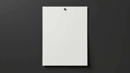 A clean, white, blank sheet of paper pinned to a dark background.