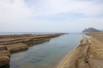 Layered rocks on the coast in Gazipasa, Antalya, Turkey, March 2025, 2